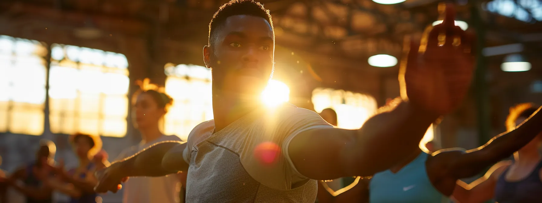 a dynamic and vibrant scene of a diverse group of athletes engaging in tailored extension exercises in an open, sunlit gym, showcasing their focused expressions and fluid movements as they enhance finger and hand mobility for improved performance and rehabilitation.